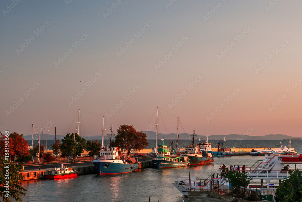 Boats on the dock at sunset in Old Nessebar, Bulgaria. 