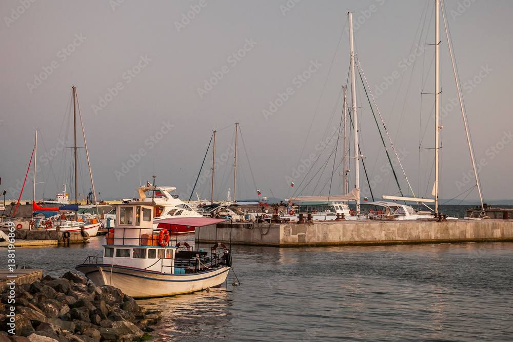 Boats on the dock at the Old Nessebar, Bulgaria at sunset. Boats on the dock at the Old Nessebar, Bulgaria at sunset.