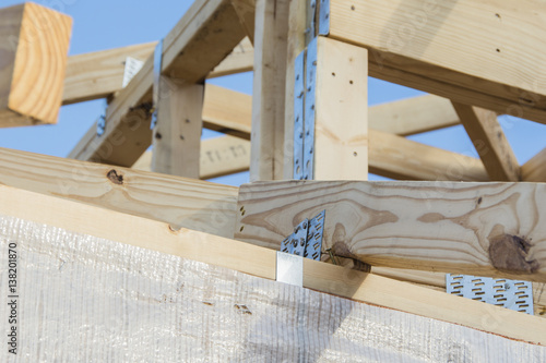 roof rafter and ceiling joist with blue sky background photo