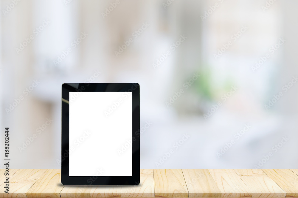 Mock up Blank screen Tablet wood table and blurred bath room background. Mock up Blank screen Tablet wood table and blurred bath room background.