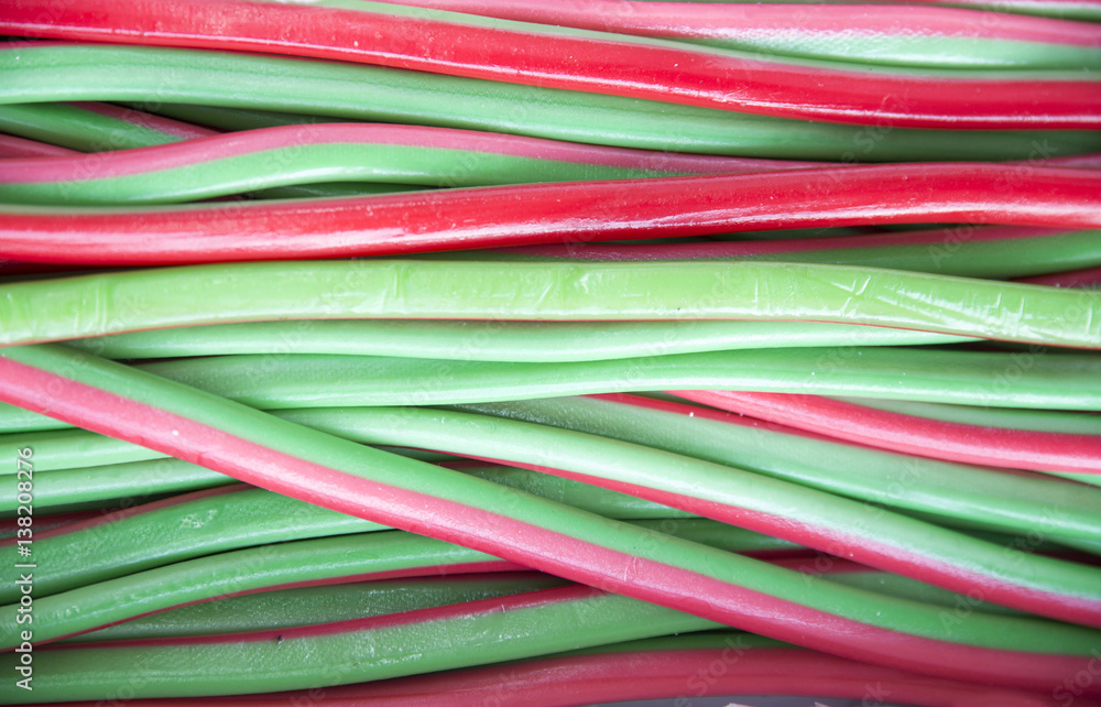 Red and green colored confectionery in the candy shop Red and green colored confectionery in the candy shop