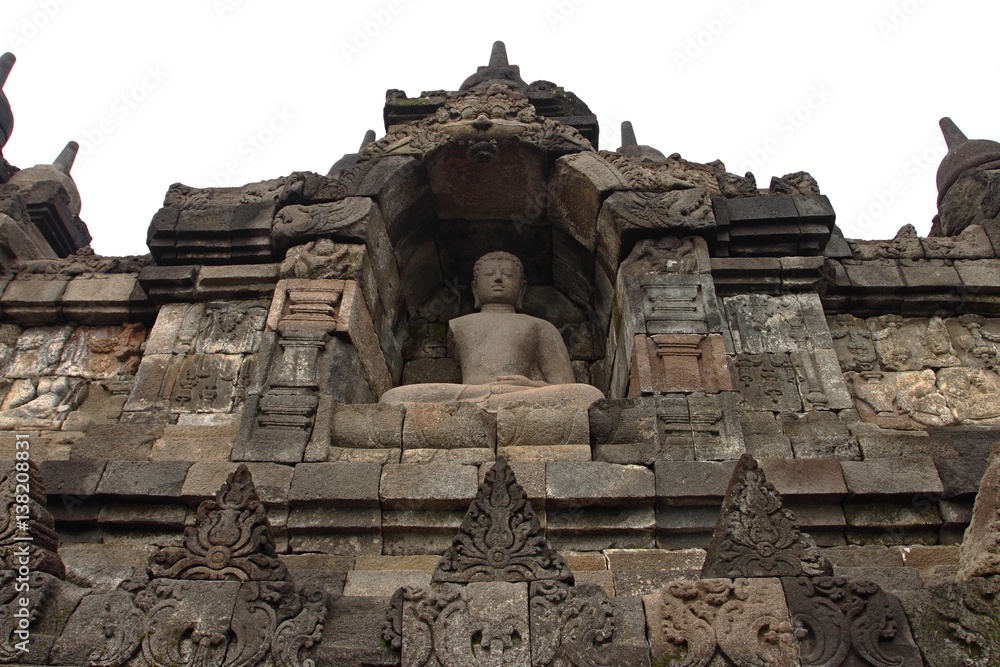 Buddha statue in stupa, Borobudur, near Yogyakarta/Borobudur temple stupas near Yogyakarta, Java, Indonesia/ Buddha statue in stupa, Borobudur, near Yogyakarta/Borobudur temple stupas near Yogyakarta, Java, Indonesia/