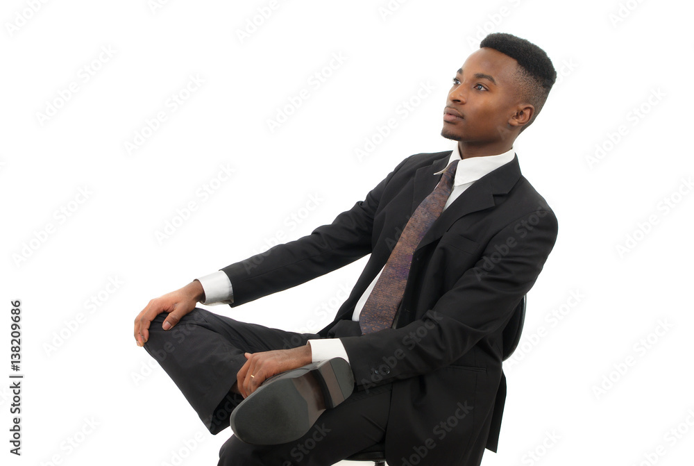 businessman seated on a chair wearing suit and tie businessman seated on a chair wearing suit and tie