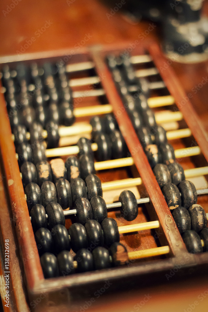 Old Chinese abacus close up - soft blur focus Old Chinese abacus close up - soft blur focus