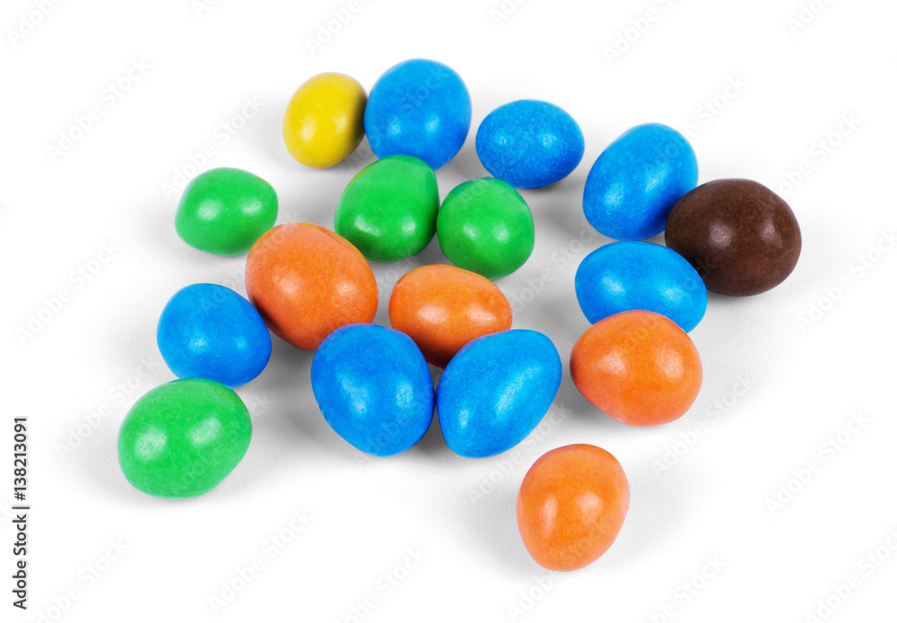 Closeup of colorful chocolate candies on white Closeup of colorful chocolate candies on white