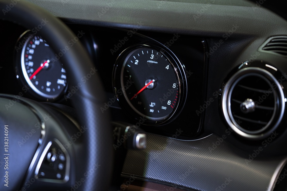Close up shot of a speedometer in a sport car - modern dashboard in luxury car