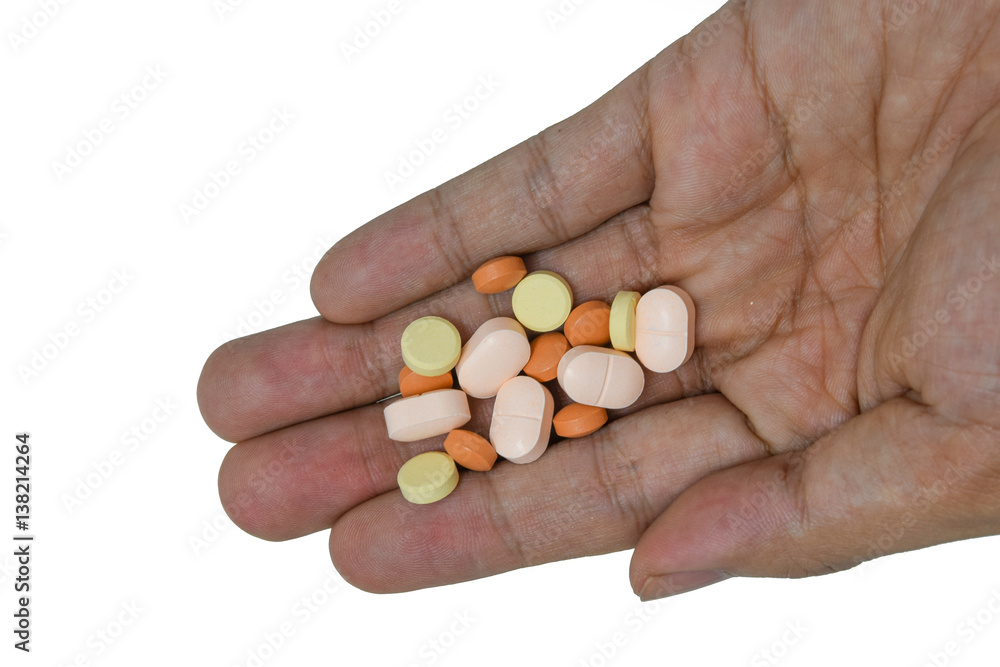 Drugs in hand isolated on white background. Drugs in hand isolated on white background.