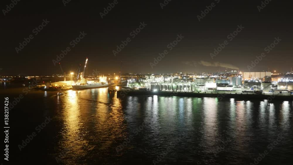 view from the elbphilharmonie in Hamburg with ships passing by and container ships being loaded and unloaded in Hamburg, Germany 2017 view from the elbphilharmonie in Hamburg with ships passing by and container ships being loaded and unloaded in Hamburg, Germany 2017