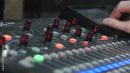 4K : Close up of sound designer working on the sound control