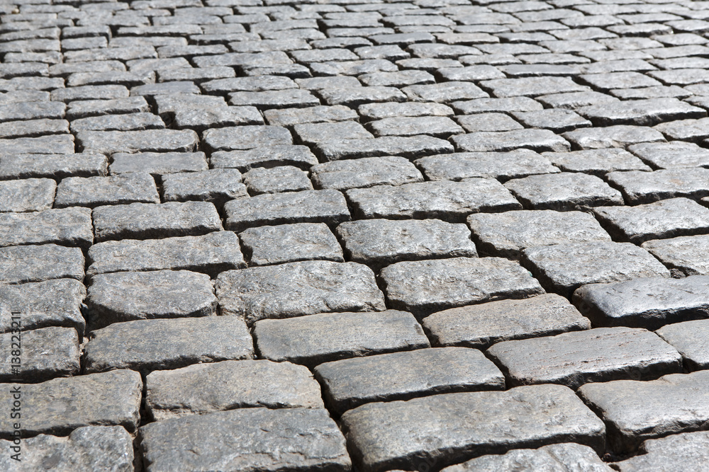 Stone paving texture. Abstract old pavement background.