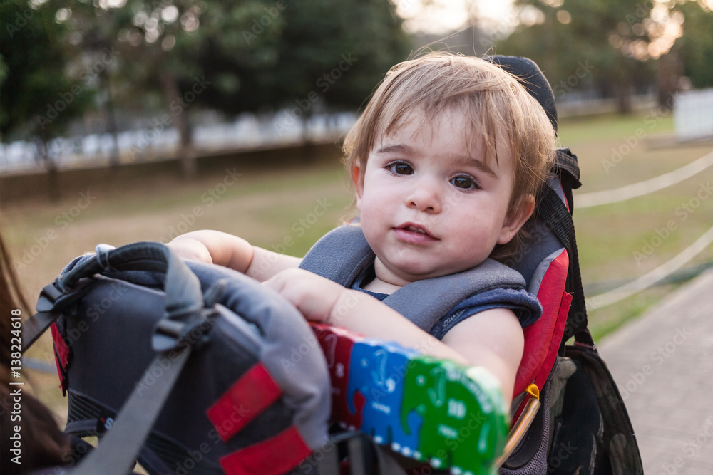 Baby girl in carrying backpack enjoying travel adventure, Baby girl in carrying backpack enjoying travel adventure,