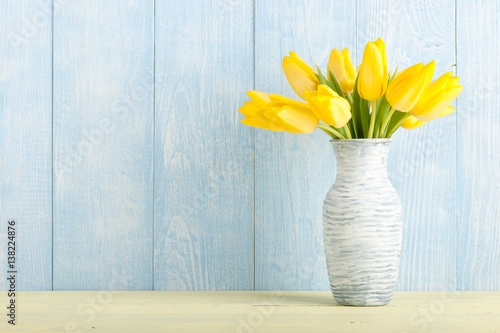 Yellow tulips in a jug