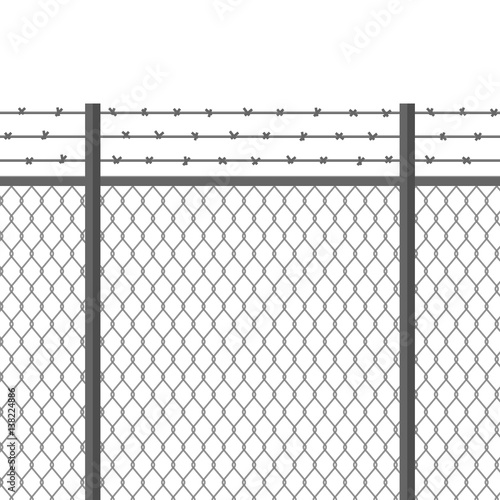 Metal fence with barbed wire. Fortification, secured property, separation concept. Steel construction for danger areas