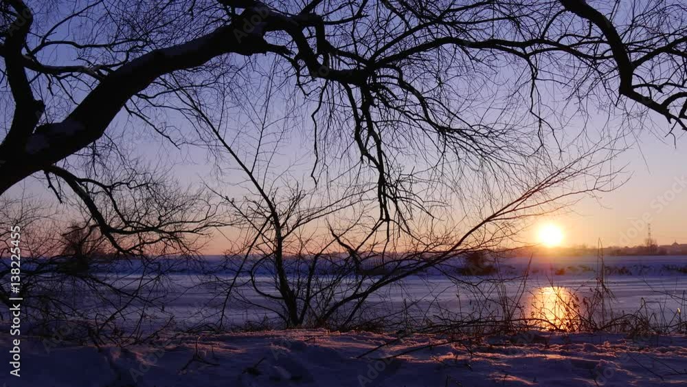 Bright Orange Sun Hides Behind a Horizon Bright Orange Sun Hides Behind a Horizon