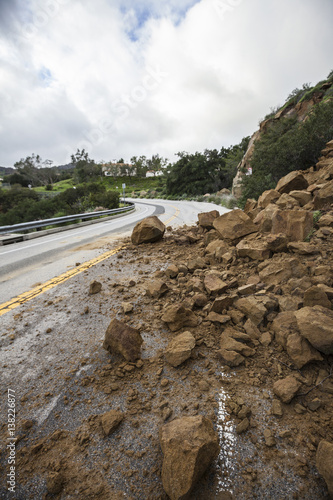 Storm damage rocks blocking Santa Susana Pass road in the San Fernando Valley area of Los Angeles, California.