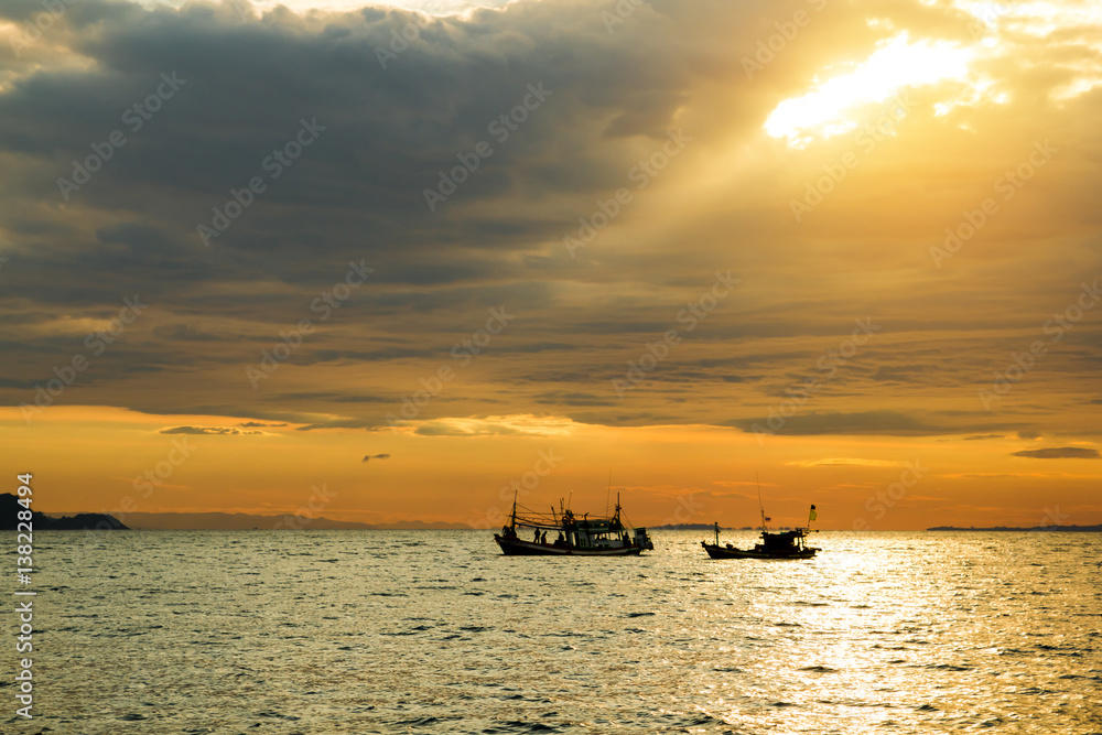 fishing boat with sunbeam background