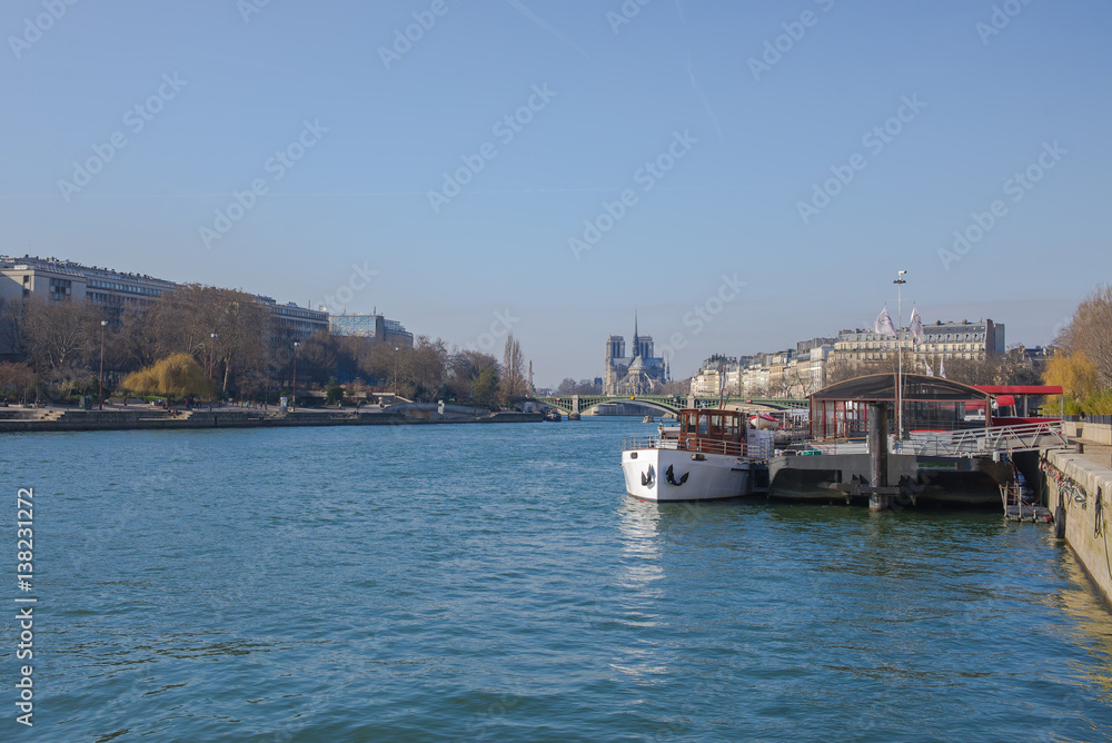 Paris, the Seine, view of Notre-Dame cathedral, houseboats Paris, the Seine, view of Notre-Dame cathedral, houseboats