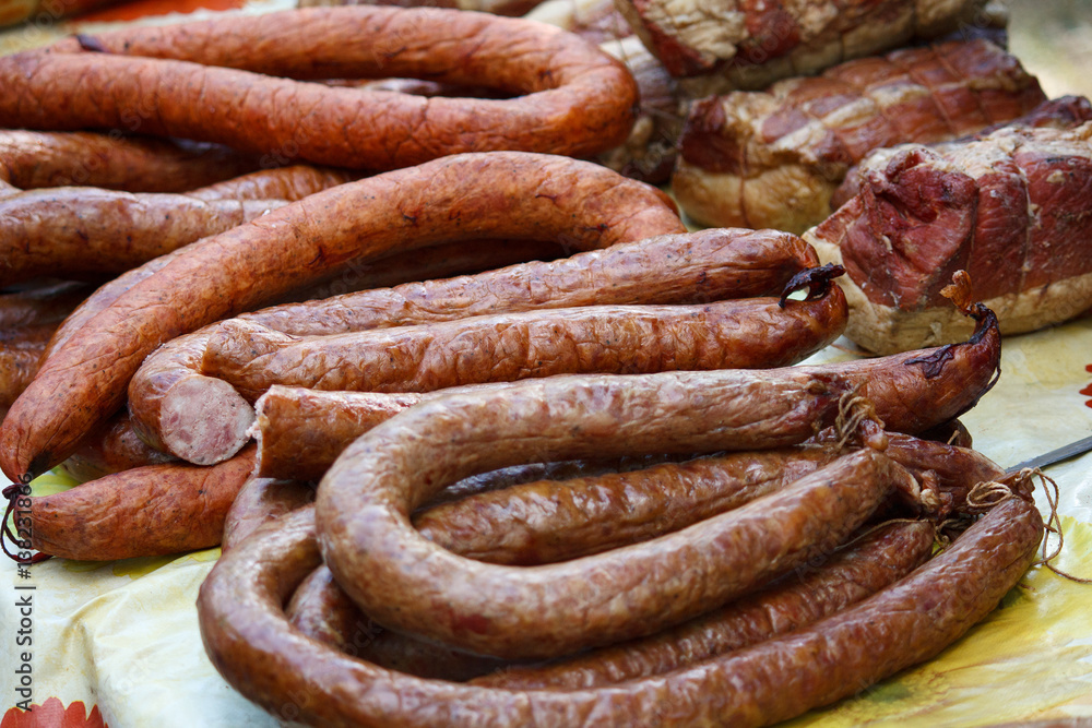 Various sausages on the counter closeup. Food Various sausages on the counter closeup. Food