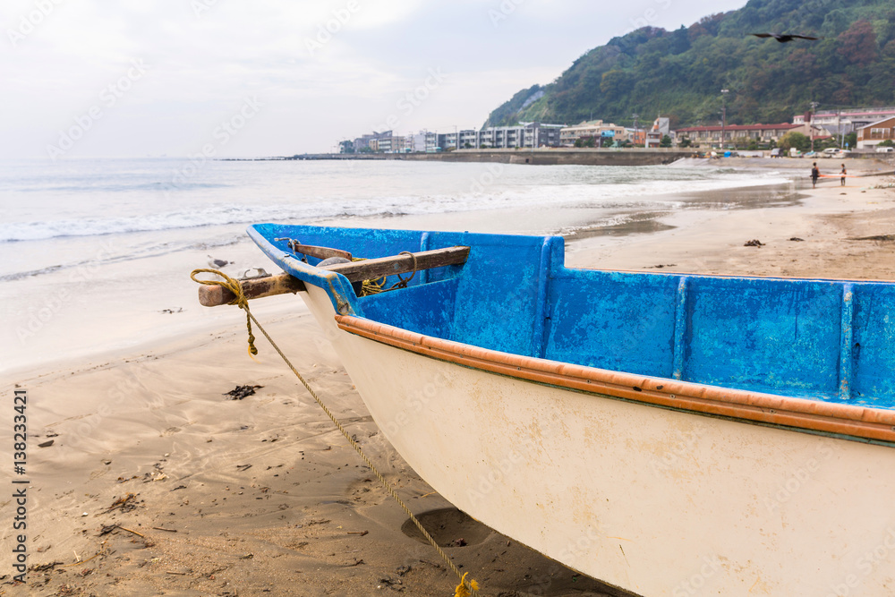 Fishing boat on the coast of Pacific ocean in Kamakura, Japan