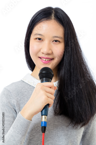 Chinese teenager with microphone