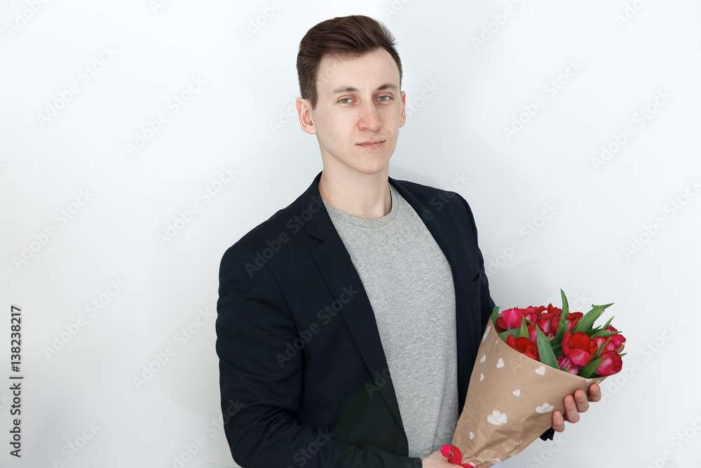 Valentine man with tulip bunch, white background