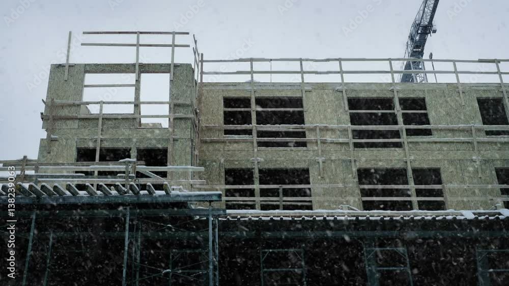 Large Building Under Construction In Snowfall Large Building Under Construction In Snowfall