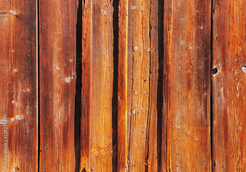 Weathered brown painted wooden board texture
Weathered brown painted wooden board texture