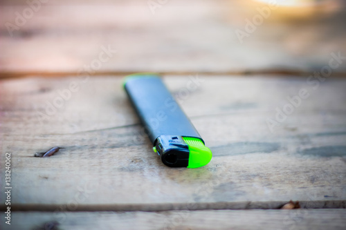 Lighter on a wooden table