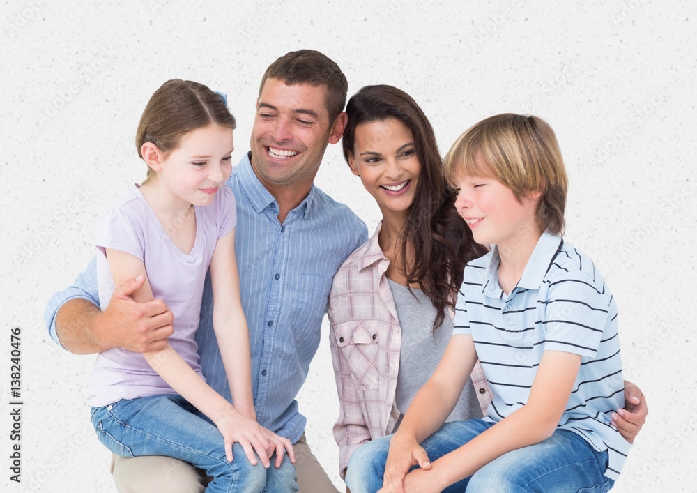 Parent and children smiling against a white background Parent and children smiling against a white background