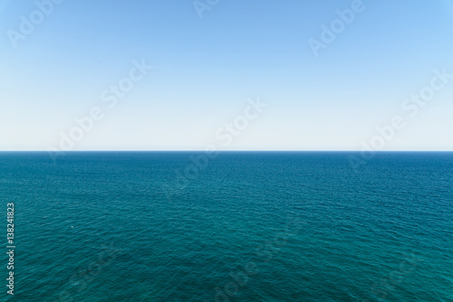 Calm Ocean Water And Clear Blue Sky