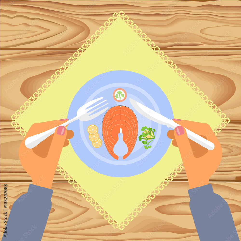 Person is eating boiled Salmon fish on wooden table. Healthy food Top ...
