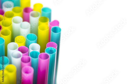 Colorful straws covering left part of image