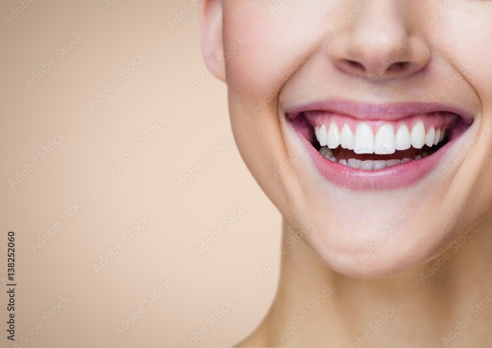Obraz premium Composite image of a woman smile against beige background