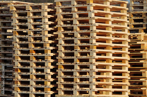 wooden euro pallets on warehouse backyard