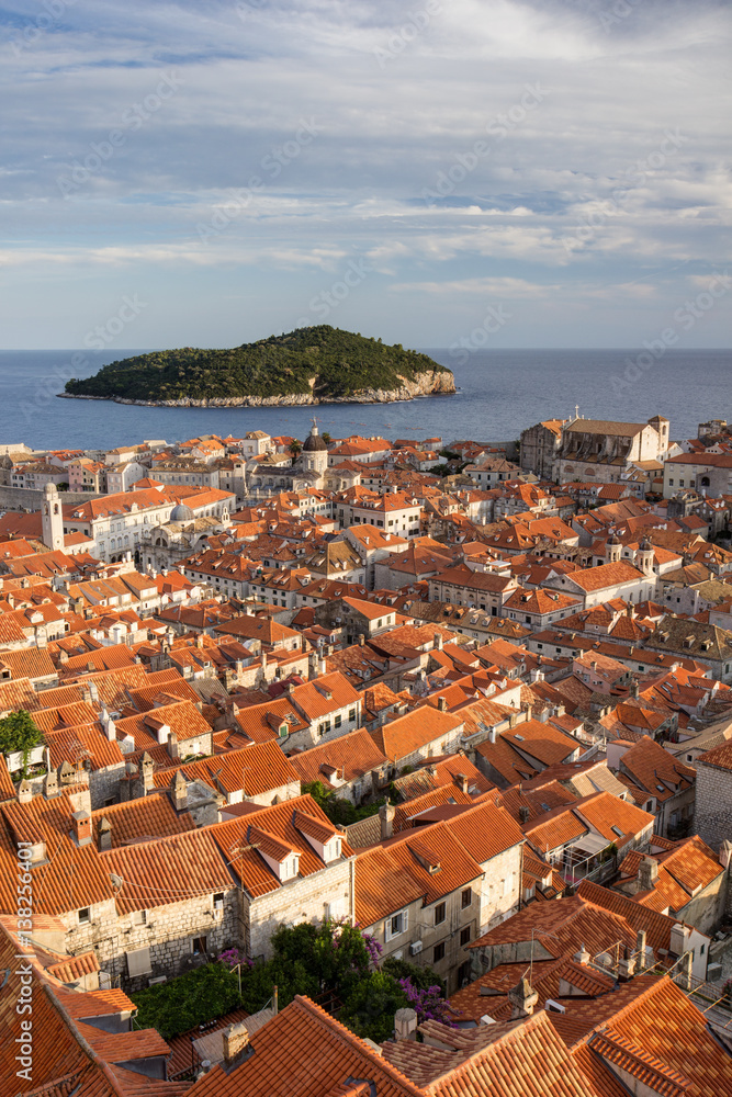 View over red roofs of the historic Old Town in Dubrovnik, Croatia, in the late afternoon.