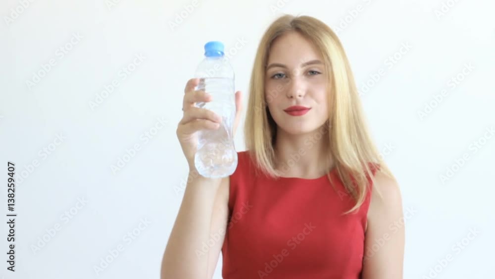 Young pretty girl drinks water Young pretty girl drinks water