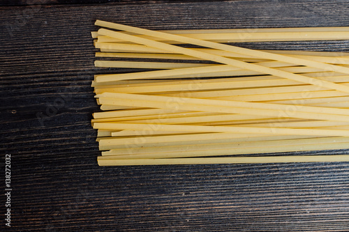 spaghetti on a wooden background