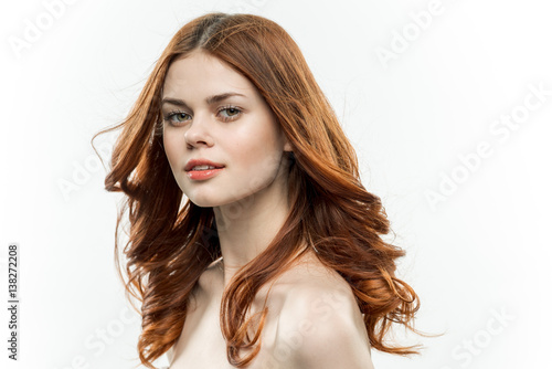 cute red-haired woman bare shoulders
