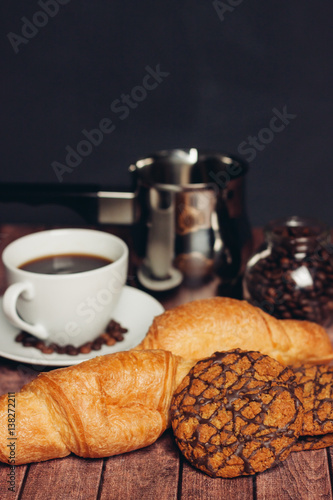 Fototapeta Naklejka Na Ścianę i Meble -  croissants round cookies with a cup of coffee