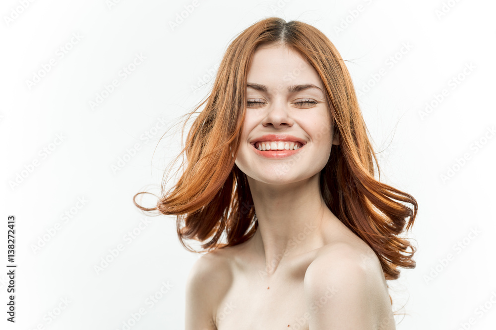 happy red-haired woman closed her eyes, bright teeth happy red-haired woman closed her eyes, bright teeth