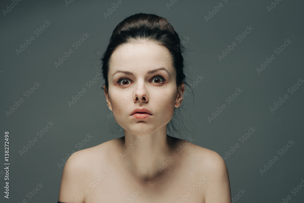 gray background, surprised woman gray background, surprised woman