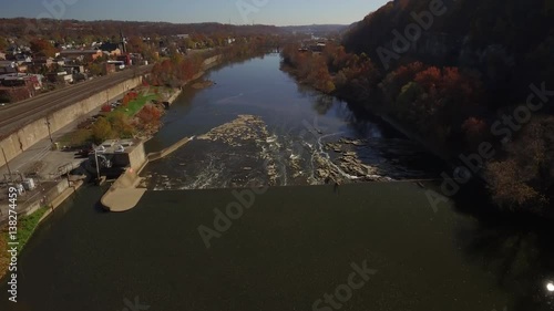 Aerial Shot Moving Overtop Fallston Falls Back Toward New Brighton, PA photo