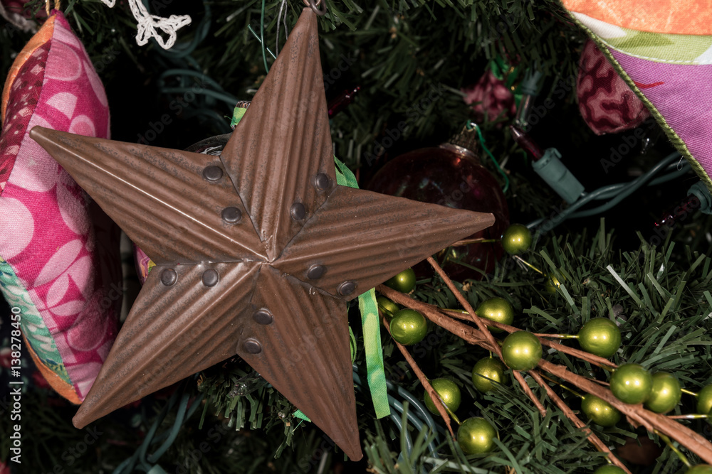 Tin Star Ornament on Christmas Tree