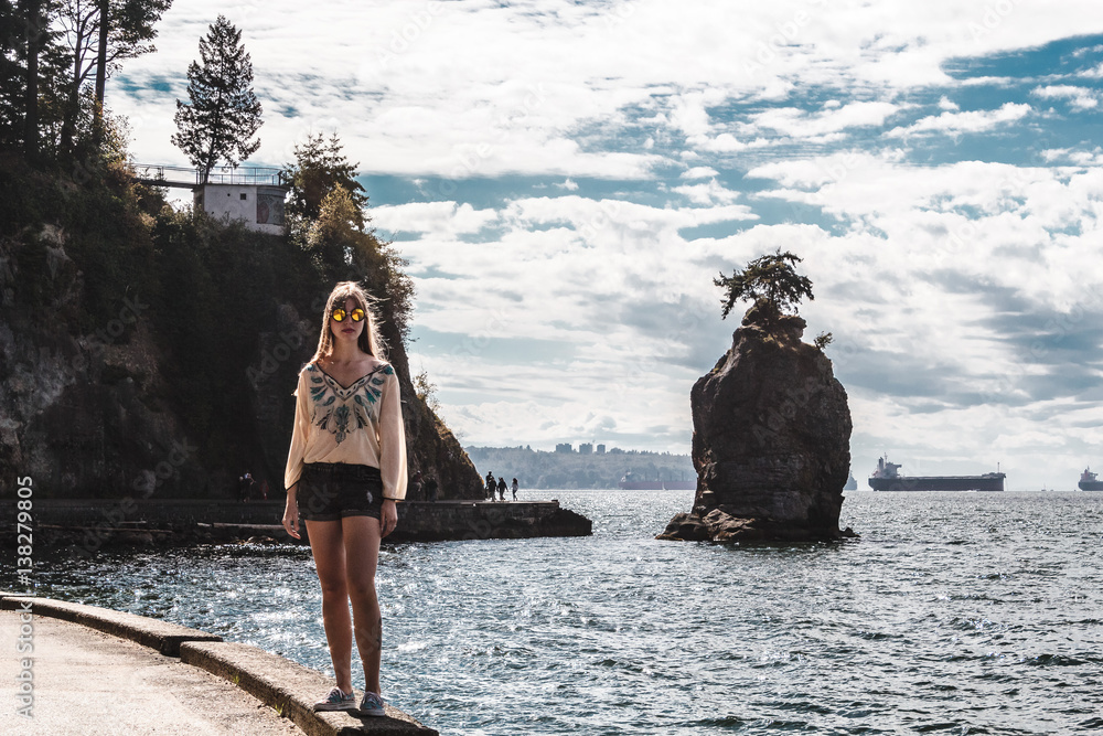 Girl near Siwash Rock in Vancouver, BC, Canada