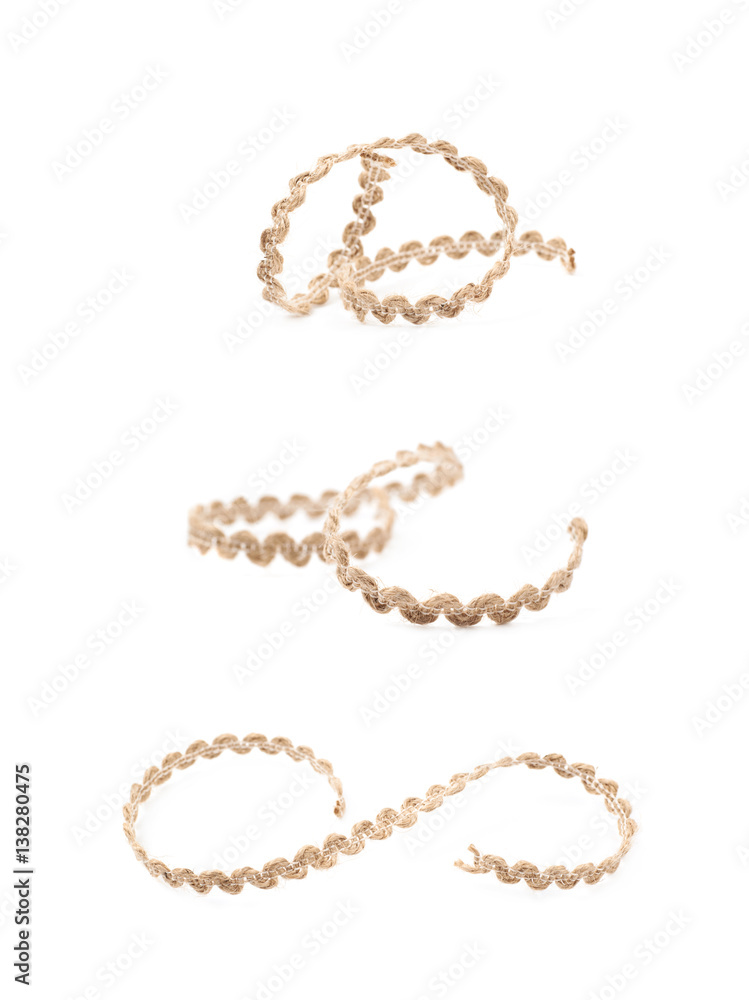 Fragment of a linen rope isolated Fragment of a linen rope isolated