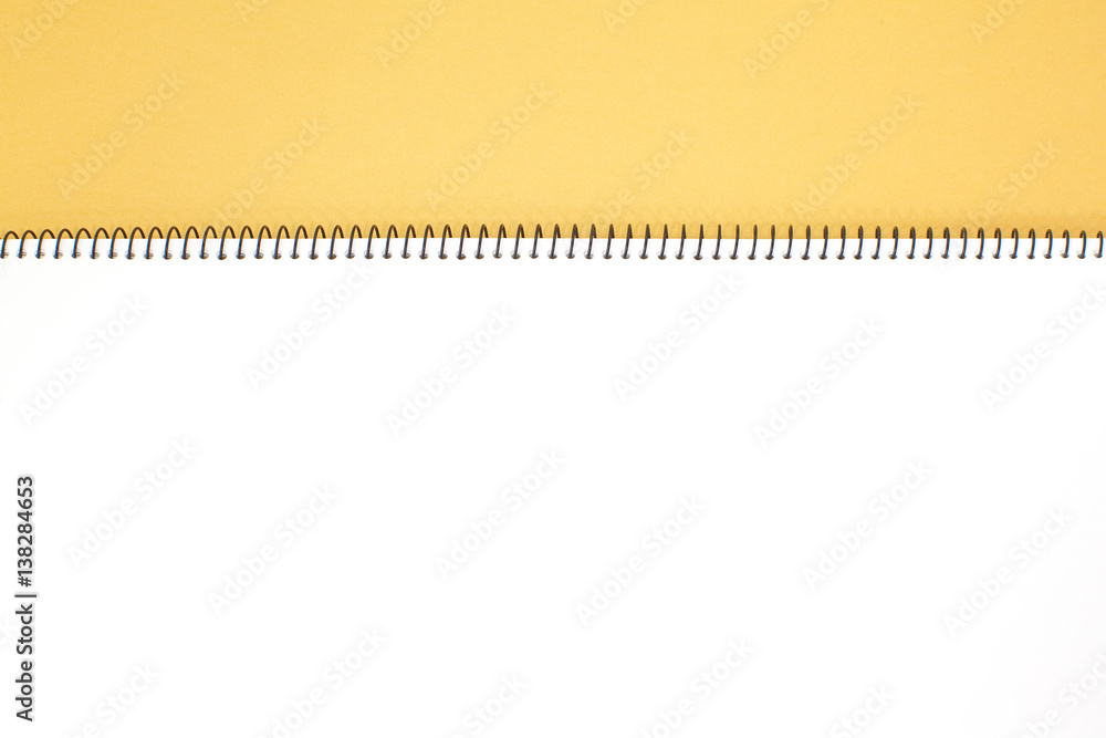 Yellow note book isolated on a white background