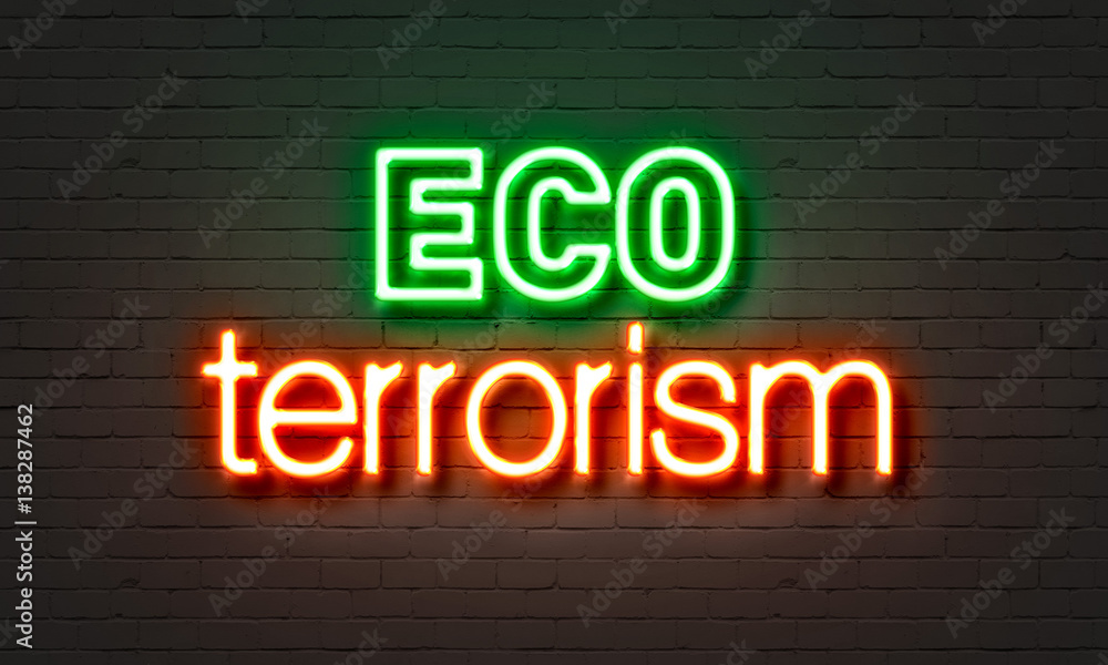 Eco terrorism neon sign on brick wall background. Eco terrorism neon sign on brick wall background.