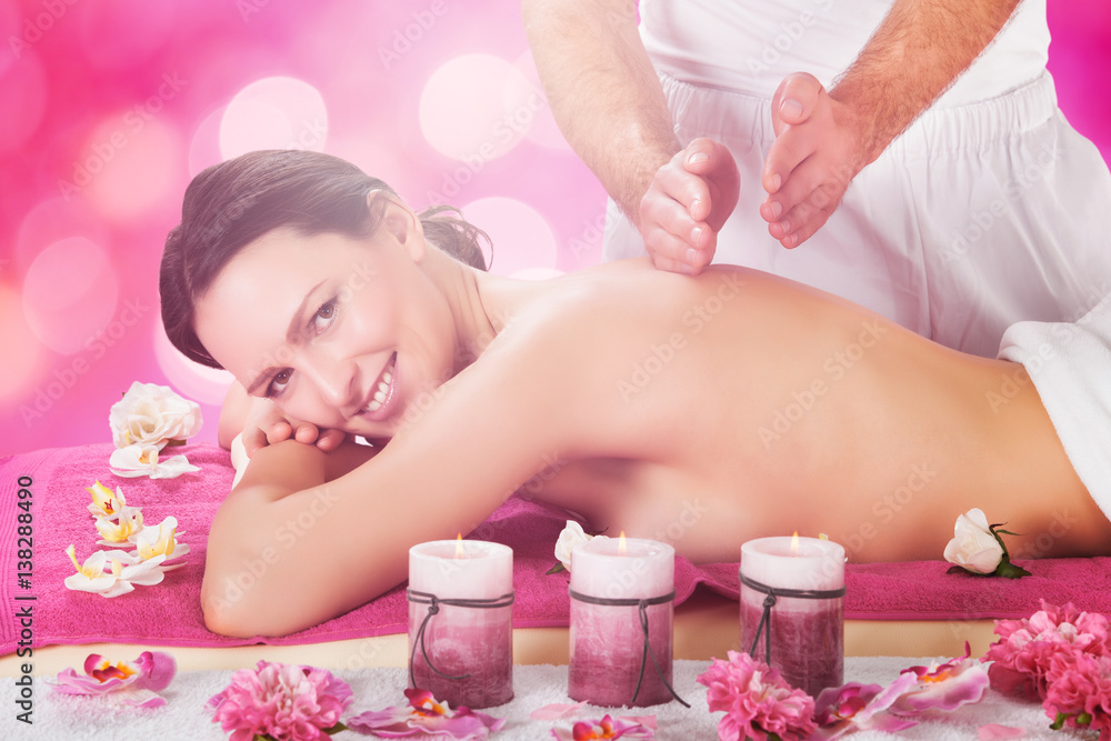 Woman Receiving Back Massage At Spa Woman Receiving Back Massage At Spa