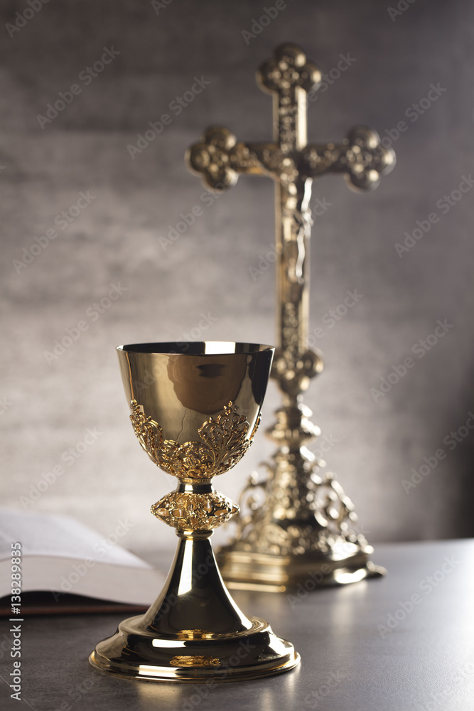 Chalice, Bible and altar cross. Chalice, Bible and altar cross.