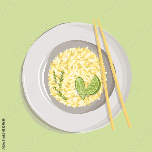 Rice pilaf with turmeric powder, rosemary, lime and chopsticks on white plate